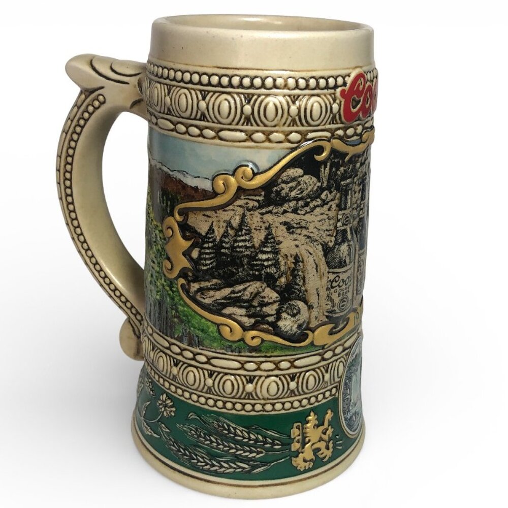1990 Edition Coors Beer Vintage Stein showing bottles near a waterfall